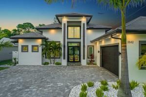 a rendering of a house with a driveway at Blue Diamond Beach Home in Bonita Springs
