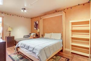 a bedroom with a bed and a closet at Montana Vacation Rental 32 Mi to Yellowstone! in Emigrant