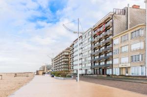a building on the beach next to the beach at Cadiz 0602 in Sint-Idesbald