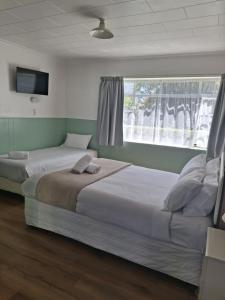 Postel nebo postele na pokoji v ubytování Bings Motel