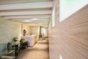 Postel nebo postele na pokoji v ubytování Hotel Los Lagos Nature