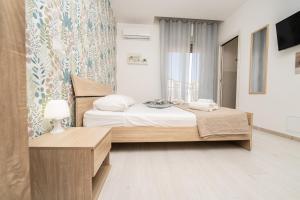 Central Room 128L客房内的一张或多张床位