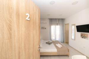 Central Room 128L客房内的一张或多张床位
