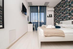 Central Room 128L客房内的一张或多张床位