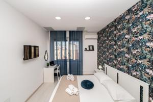 Central Room 128L客房内的一张或多张床位