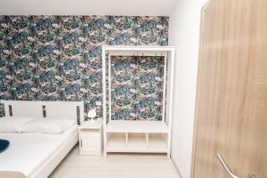 Central Room 128L客房内的一张或多张床位