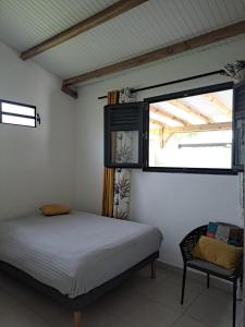 Postel nebo postele na pokoji v ubytování Maison bien équipée avec Clims Netflix Lave Vaiselle Belles Rivieres à 4km