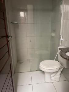 Koupelna v ubytování Casa de Temporada