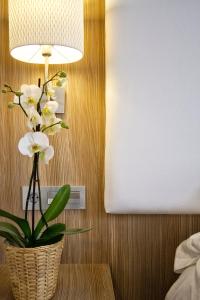 Postel nebo postele na pokoji v ubytování Hotel Los Lagos Nature