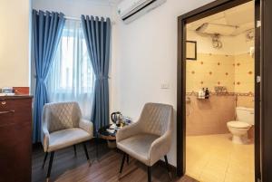 Koupelna v ubytování A25 Hotel - Đội Cấn 1