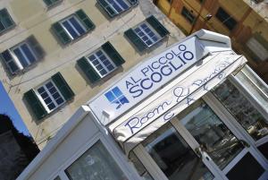 Сертификат, награда, вывеска или другой документ, выставленный в Al Piccolo Scoglio - Room & Breakfast