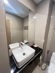 Koupelna v ubytování เวลโกรว์ โฮเทล - Wellgrow Hotel