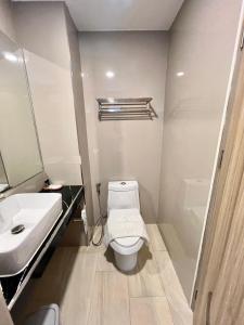 Koupelna v ubytování เวลโกรว์ โฮเทล - Wellgrow Hotel