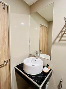 Koupelna v ubytování เวลโกรว์ โฮเทล - Wellgrow Hotel