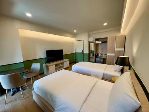 TV a/nebo společenská místnost v ubytování U Sabai Hotel Bangkok