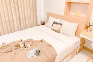 タンゲランにあるGood and Cozy Stay 2BR Tokyo Riverside PIK 2 Apartment By Travelioのギャラリーの写真