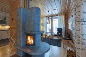 TV a/nebo společenská místnost v ubytování Hotel Ylläshumina