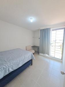 Ένα ή περισσότερα κρεβάτια σε δωμάτιο στο Residential House