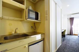 Kuchyň nebo kuchyňský kout v ubytování Hakuba Gateway Hotel