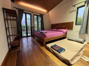 Postel nebo postele na pokoji v ubytování Villa Aman in Georgetown