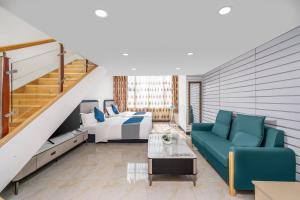 Guangzhou Youke Serviced Apartment1min to Line5 Taojin STN-Free shuttle bus during the Canton Fair的休息区