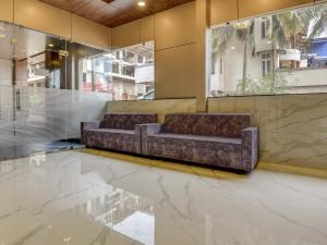 Posezení v ubytování Super Townhouse Madgaon