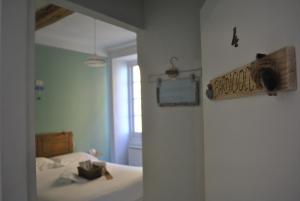Кровать или кровати в номере Al Piccolo Scoglio - Room & Breakfast