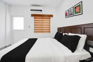 Letto o letti in una camera di Super Collection O Munnar