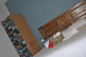 Кровать или кровати в номере Al Piccolo Scoglio - Room & Breakfast