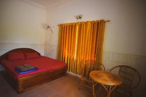 Postel nebo postele na pokoji v ubytování Yellow Star Hostel