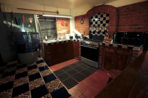 Kuchyň nebo kuchyňský kout v ubytování Cabin in the forest of CDMX