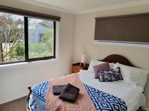 Voodi või voodid majutusasutuse Torquay Homestay Guesthouse toas