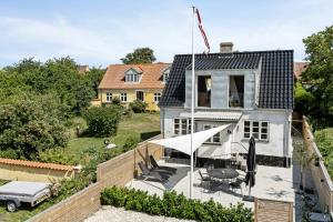an aerial view of a house with a patio at Enjoy Møn From Historic House in Stege