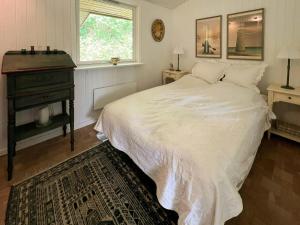 Ένα ή περισσότερα κρεβάτια σε δωμάτιο στο Cozy Summer House In Nysted With Sea View