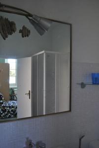 Фотография из галереи Al Piccolo Scoglio - Room & Breakfast в Камольи