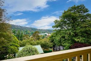 a view from the balcony of a house at Spacious 3BR Family Haven in Upper Ferntree Gully in Fern Tree Gully