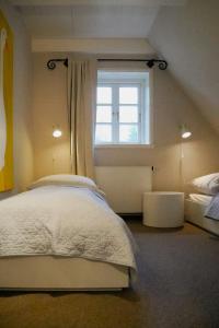 Ένα ή περισσότερα κρεβάτια σε δωμάτιο στο North Frisian Apartment On Föhr Island