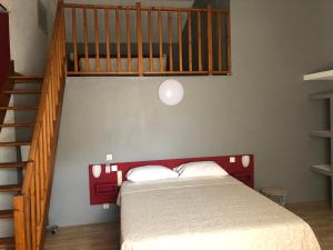 Voodi või voodid majutusasutuse Hotel Aurelia toas
