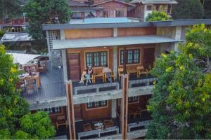Balkón nebo terasa v ubytování วิลลา วาดี แม่กำปอง Villa Vadee Maekampong