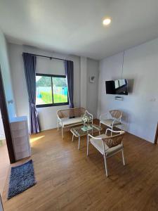 Télévision ou salle de divertissement dans l'établissement Chaba2