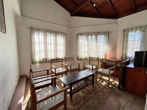 Μια τηλεόραση ή/και κέντρο ψυχαγωγίας στο The Green Savanna Holiday Bungalow Nuwara Eliya