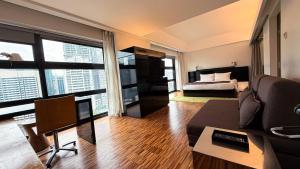 Postel nebo postele na pokoji v ubytování Hotel Maya Kuala Lumpur City Centre