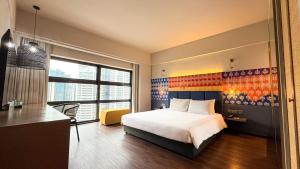 Postel nebo postele na pokoji v ubytování Hotel Maya Kuala Lumpur City Centre