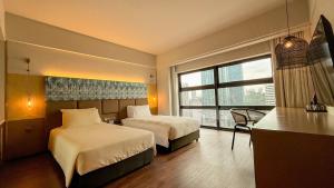 Postel nebo postele na pokoji v ubytování Hotel Maya Kuala Lumpur City Centre