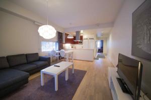 Posezení v ubytování Kotimaailma Apartments Turku