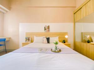 Postel nebo postele na pokoji v ubytování Nice Studio at Parkland Avenue Apartment By Travelio + 13 fotografií