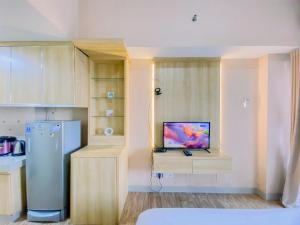 Kuchyň nebo kuchyňský kout v ubytování Nice Studio at Parkland Avenue Apartment By Travelio