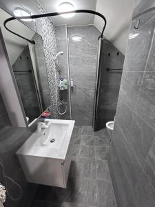 Koupelna v ubytování 瑪麗殿民宿 + 21 fotografií