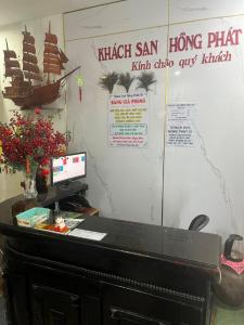 an office with a desk with a computer on it at Hồng Phát 68 Hotel in Ho Chi Minh City