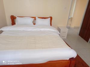 Postel nebo postele na pokoji v ubytování Atlantis BNB